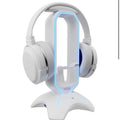 Tilted Wireless Headphones with LED Charging Stand