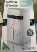 Nizoni Compact 1.2-Liter Dehumidifier for Rooms Up to 110 Sq. Ft.